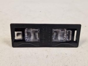 24173139 – 8W6943021 – Registration plate light